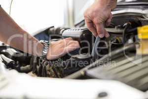 Mechanic working on an engine