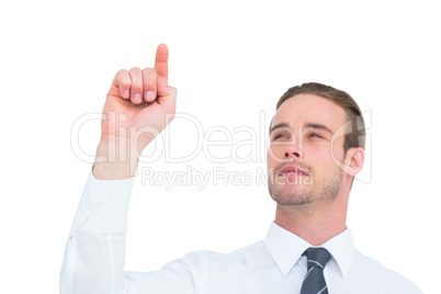 Cheerful businessman pointing with his finger