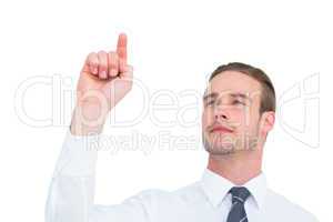 Cheerful businessman pointing with his finger