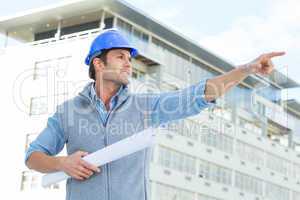 Architect with blueprint pointing away