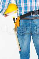 Rear view of handyman wearing tool belt