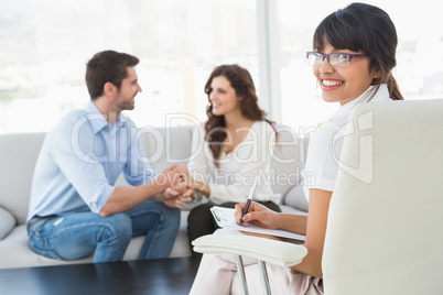 Reconciled couple smiling at each other