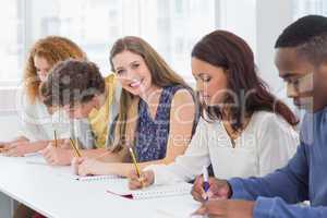 Fashion students being attentive in class