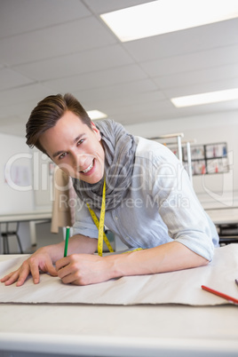 Fashion student drawing on pattern