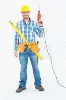 Portrait of smiling repairman with tools