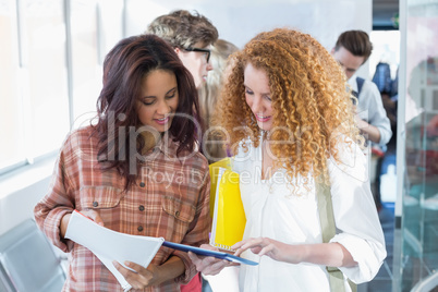 Students discussing their class notes