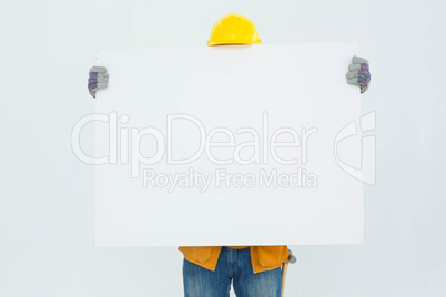 Technicial holding blank billboard