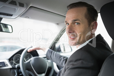 Handsome businessman looking at camera Handsome businessman looking at camera