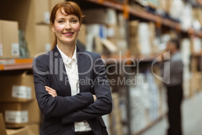 Female manager with arms crossed