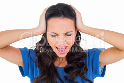 Angry brunette shouting at camera