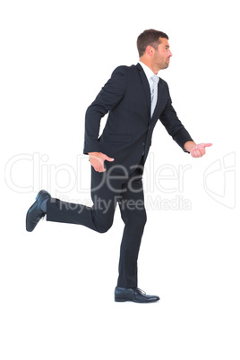 Businessman walking with his hands out