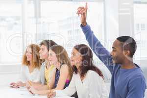 Fashion students being attentive in class