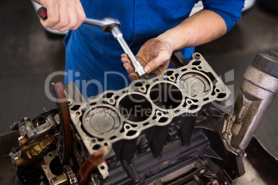 Mechanic working on an engine