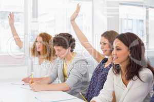 Fashion students being attentive in class