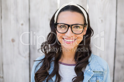 Pretty hipster smiling at camera