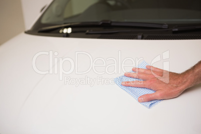 Close up of man cleaning his car