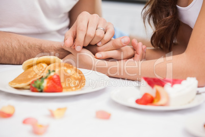 Close up of young couple having a romantic breakfast