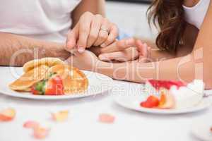 Close up of young couple having a romantic breakfast