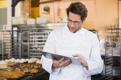 Baker reading something on clipboard Baker reading something on clipboard