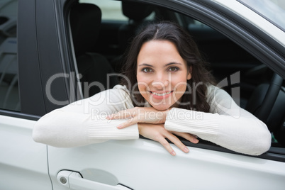 Happy woman in the drivers seat