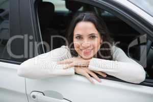 Happy woman in the drivers seat