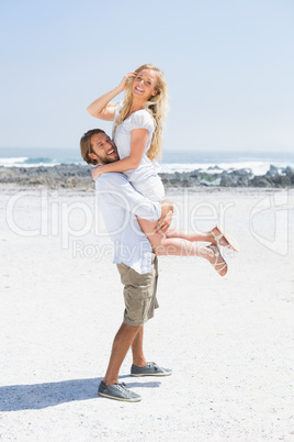 Cute couple hugging on the beach