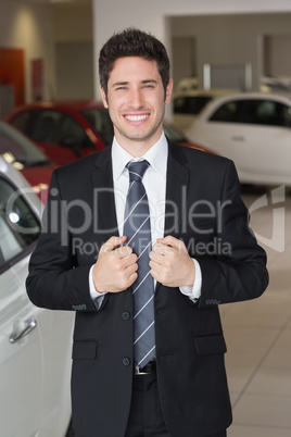 Handsome businessman in suit stading