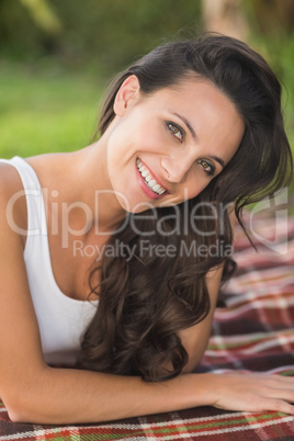 Pretty brunette smiling at camera