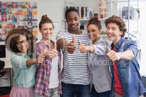 Fashion students smiling at camera together