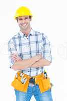 Technician standing arms crossed over white background