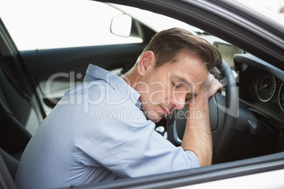 Drunk man slumped on steering wheel