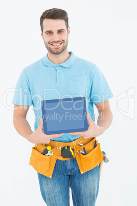 Construction worker showing blank screen on digital tablet