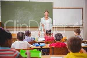 Pupil raising their hands during class