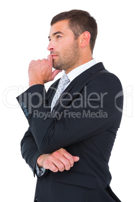 Frowning businessman thinking