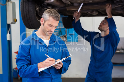 Team of mechanics working together