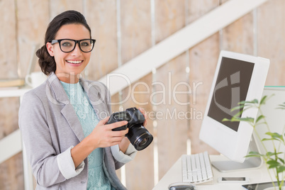 Stylish brunette working from home