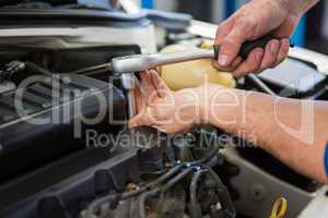 Mechanic working on an engine