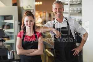 Servers smiling at the camera