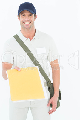 Happy courier man giving envelops