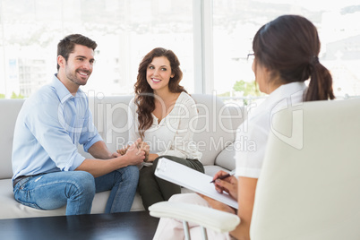 Reconciled couple smiling at each other