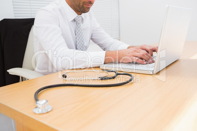 Businessman using his laptop