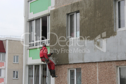 specialist carring out warming of building