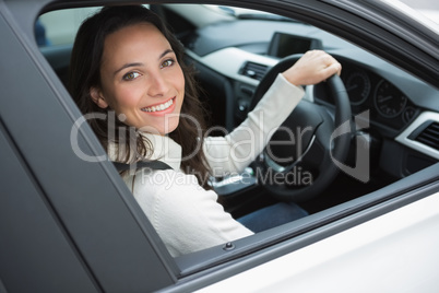 Smiling woman in the drivers seat
