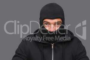 Man in balaclava looking at camera