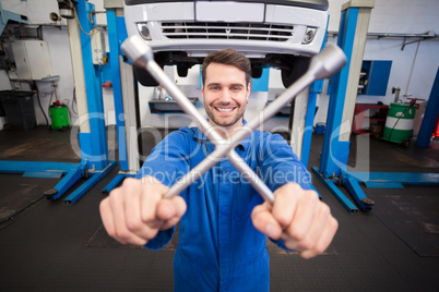 Mechanic smiling at the camera