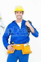Happy electrician with wires against white background