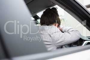 Woman sleeping on the wheel