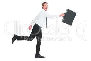 Happy businessman leaping with his briefcase