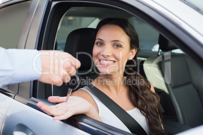 Young woman getting her key