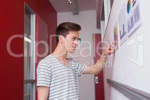 Student looking graphics on the wall
